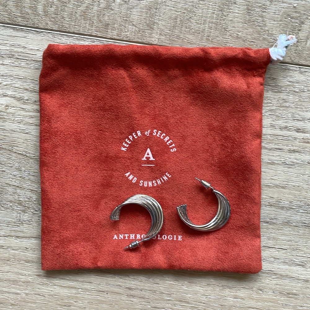 Anthropologie twisted metal hoop earrings in silver